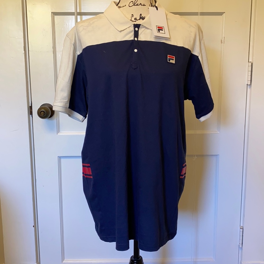 Men’s size L Fila polo in navy blue/cream.